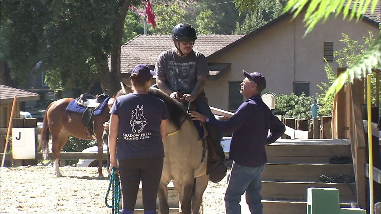 Veterans getting therapy on horseback