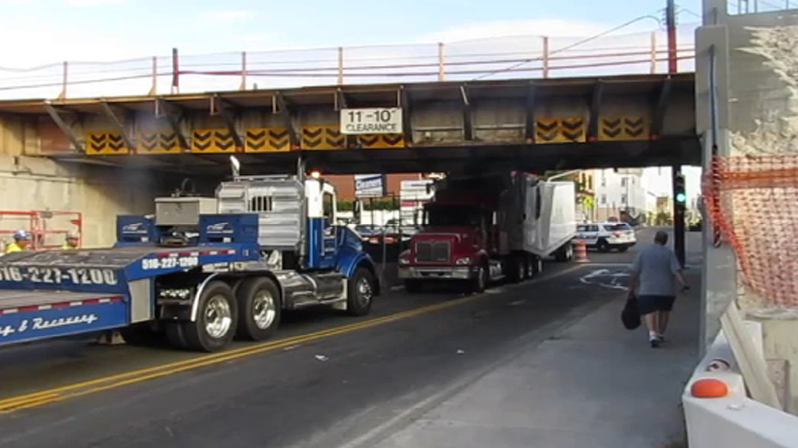 Long Island truck into overpass spurs announcement on bridge raising