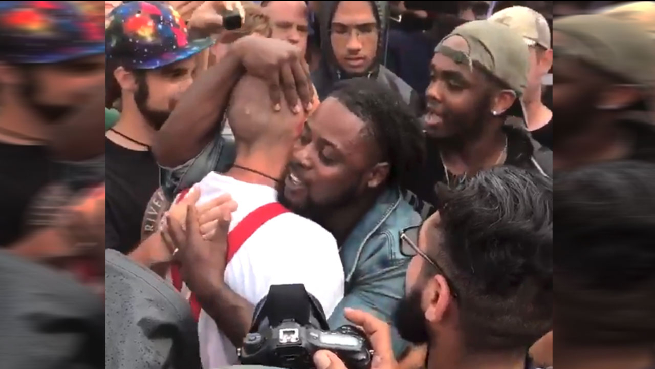 Black protester hugs selfdescribed Nazi at white