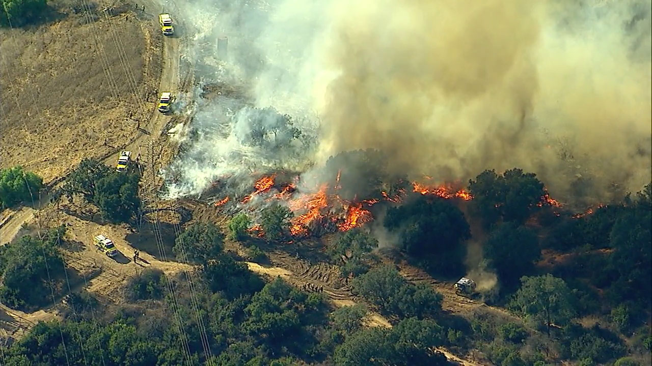 Wind-driven brush fire in Ventura 50 percent contained, fire officials say