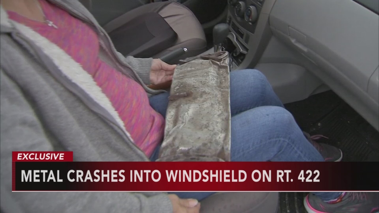 Truck muffler smashes through car windshield on Rte. 422