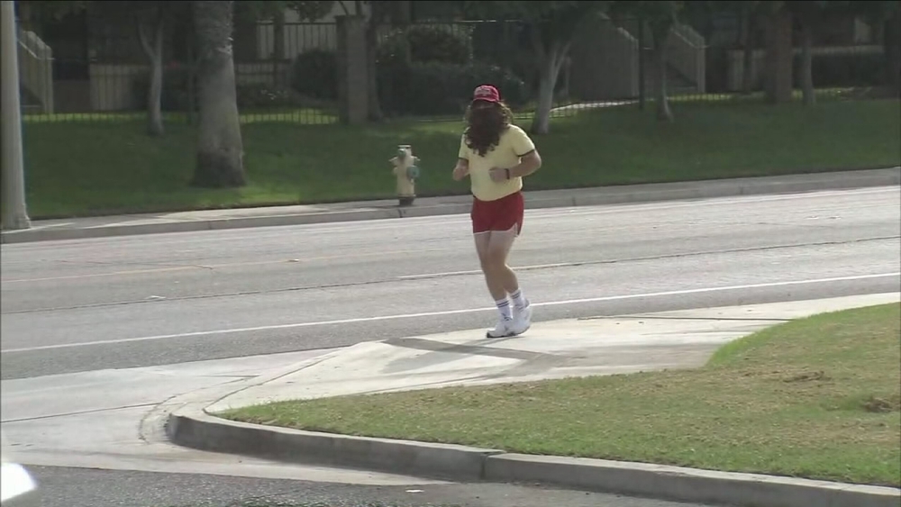 Forrest Gump impersonator running around Riverside