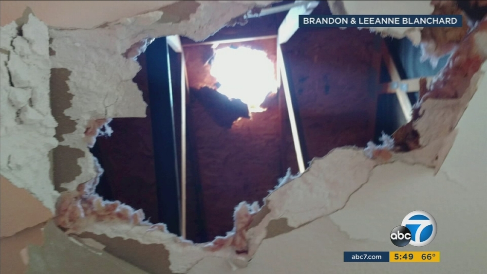 Ice possibly from a plane falls through roof of Chino home