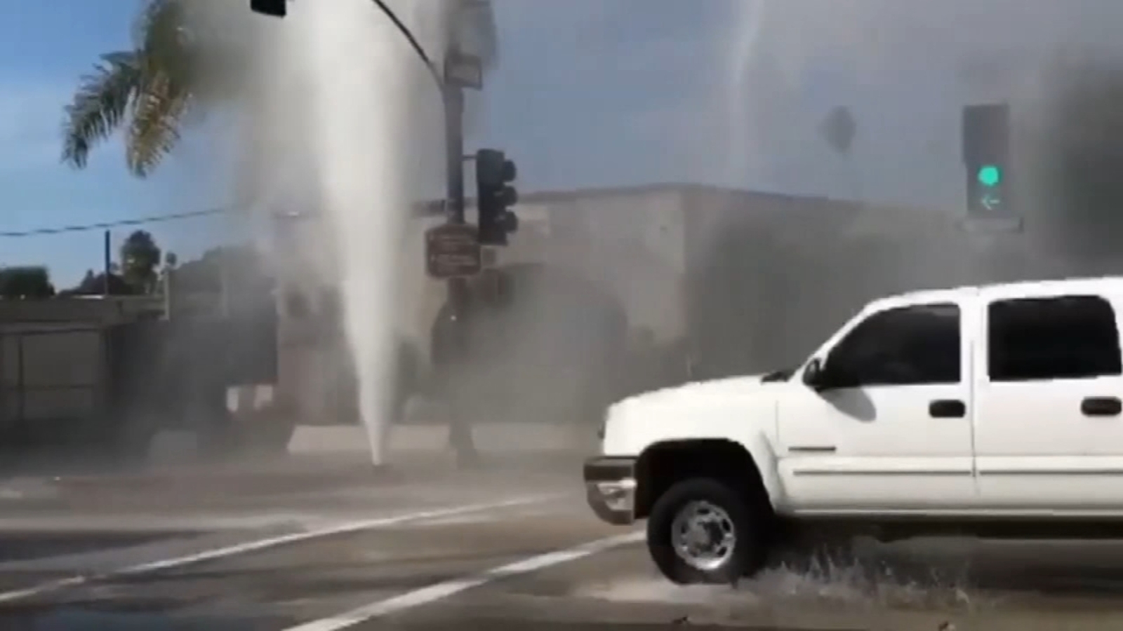 VIDEO Water shoots into air after car hits hydrant in California