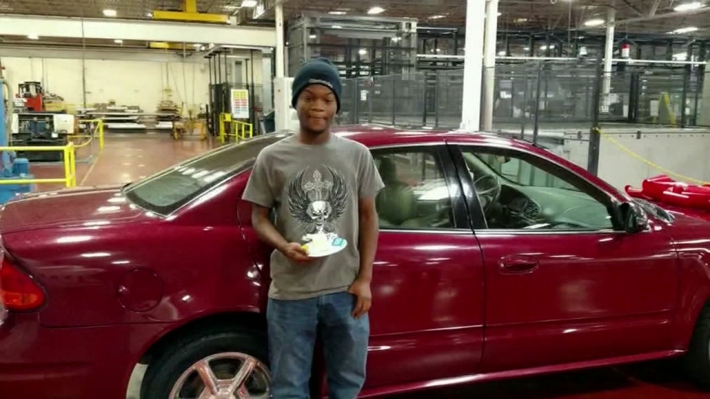 Coworkers buy car for teen who rides bike miles to work