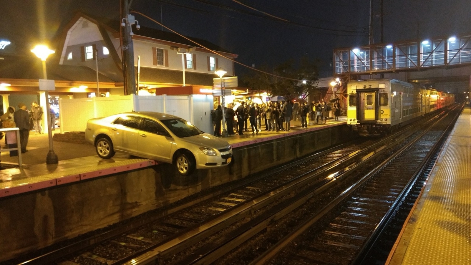 'Confused' driver ends up halfway on Mineola Long Island Rail Road