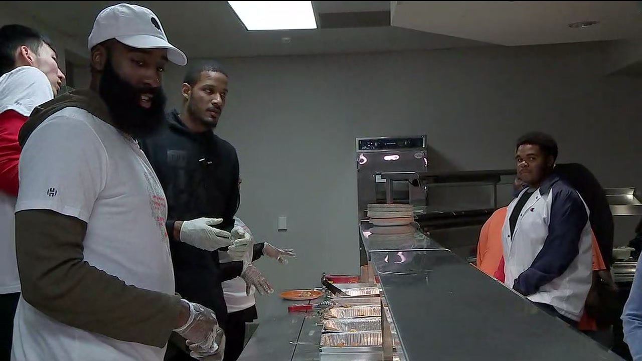 James Harden helps serve Thanksgiving meals