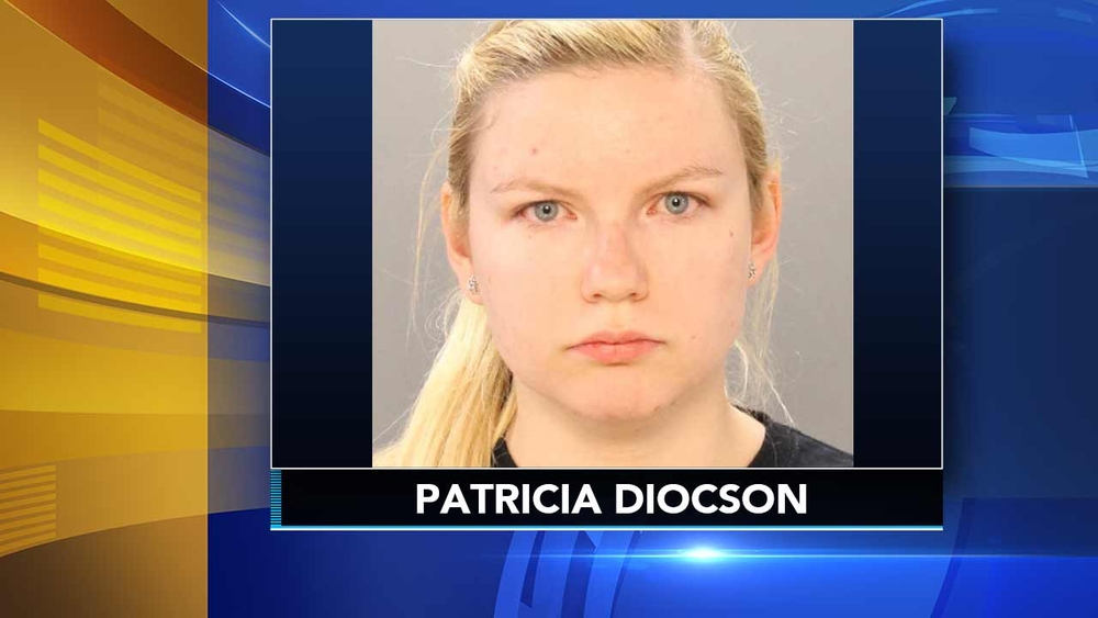 Woman charged in grandfather's murder
