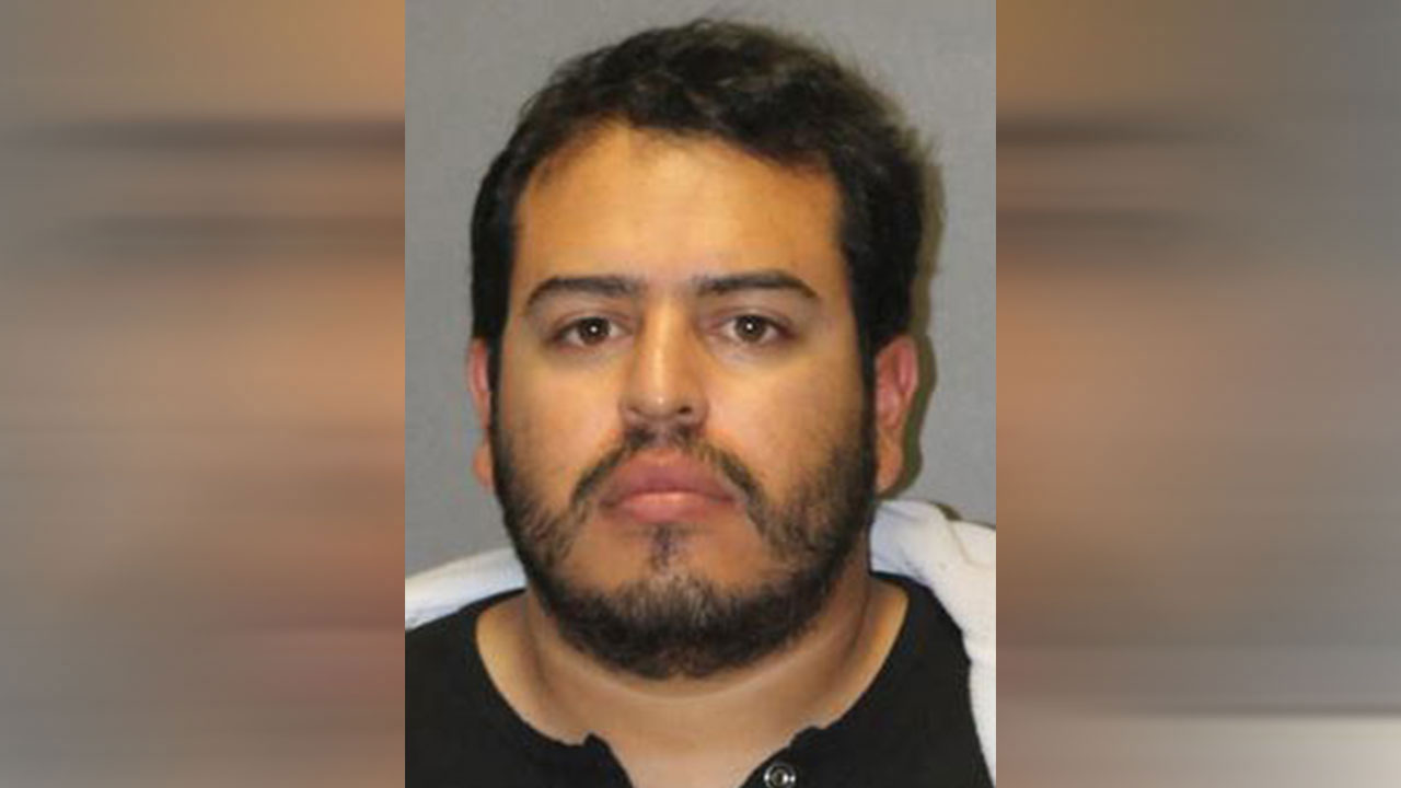 Man charged and arrested for allegedy ejaculating into co-worker's water bottle