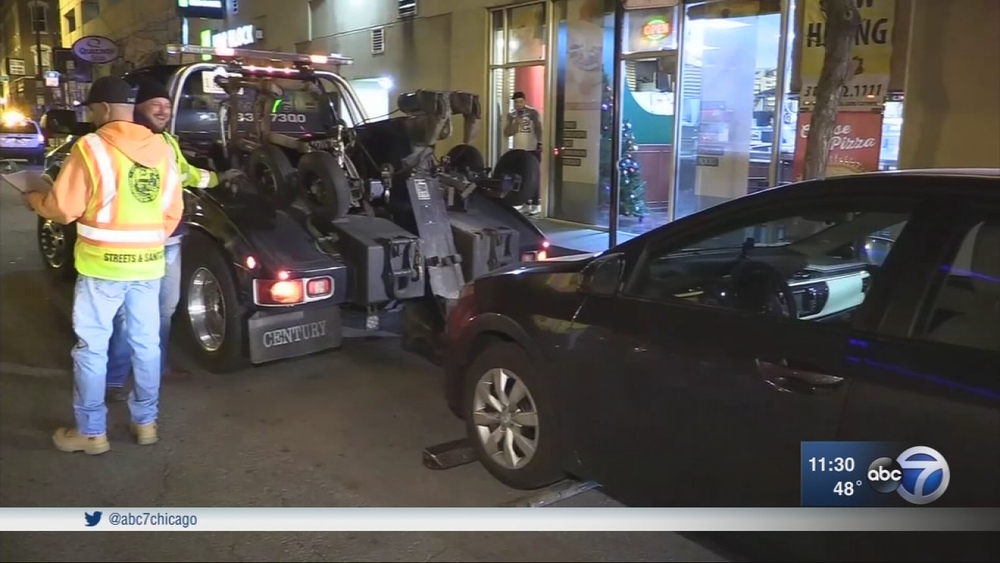 Cars towed as winter overnight parking ban takes effect