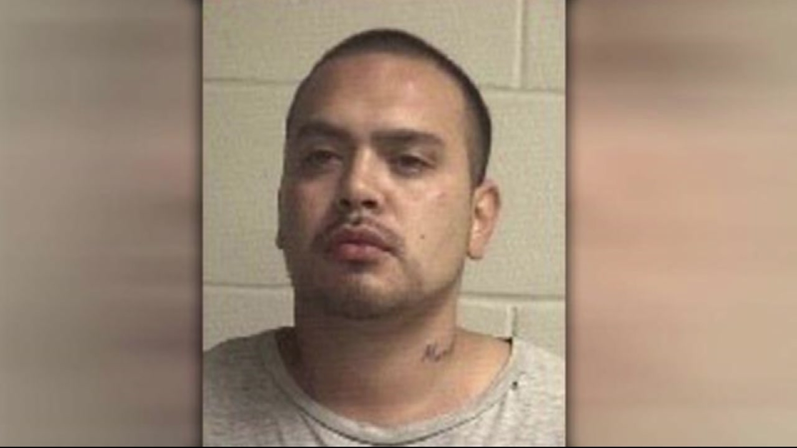 Man in custody, accused of fatally shooting acquaintance of wife in