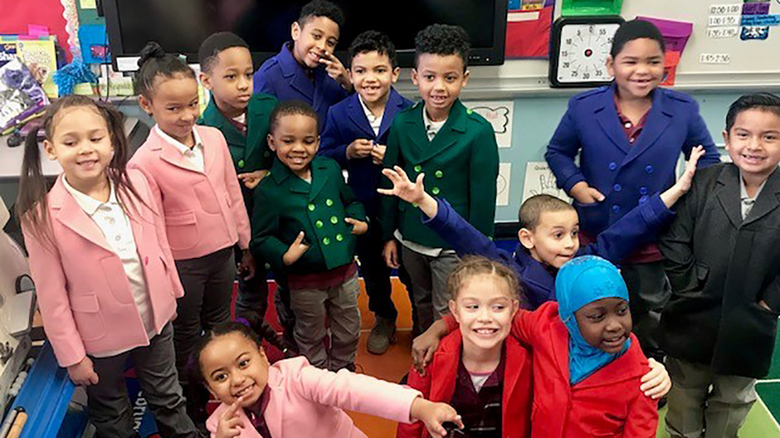 Designer delivers custommade coats to Bronx elementary school students