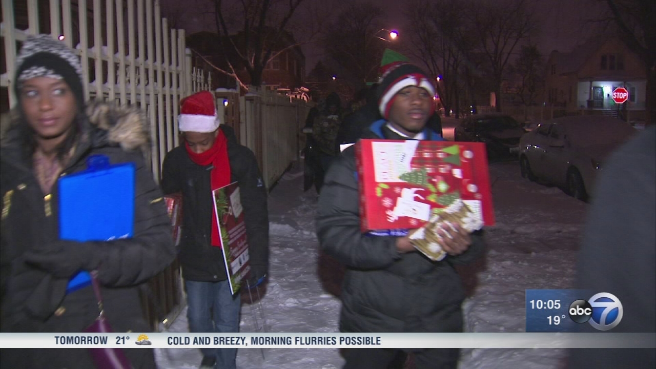 Families in need surprised with gifts on Christmas Eve