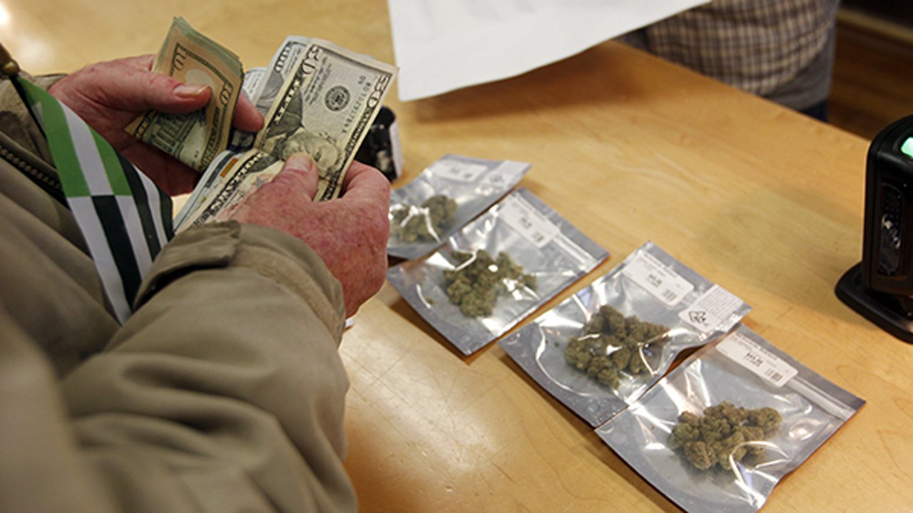 California pot shops ring in 2018, ring up first legal sales