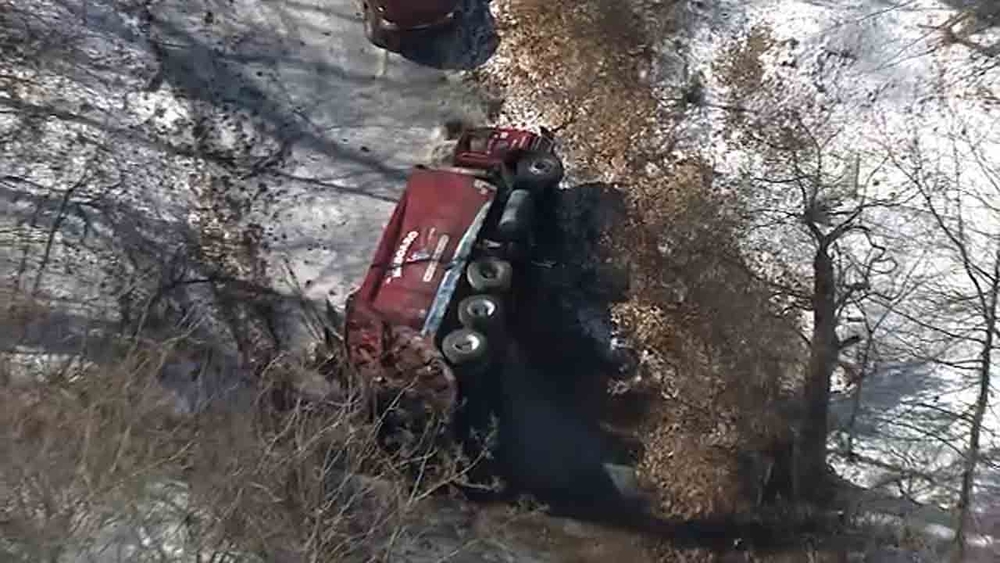 VIDEO: Trash truck overturns in Whitemarsh Township