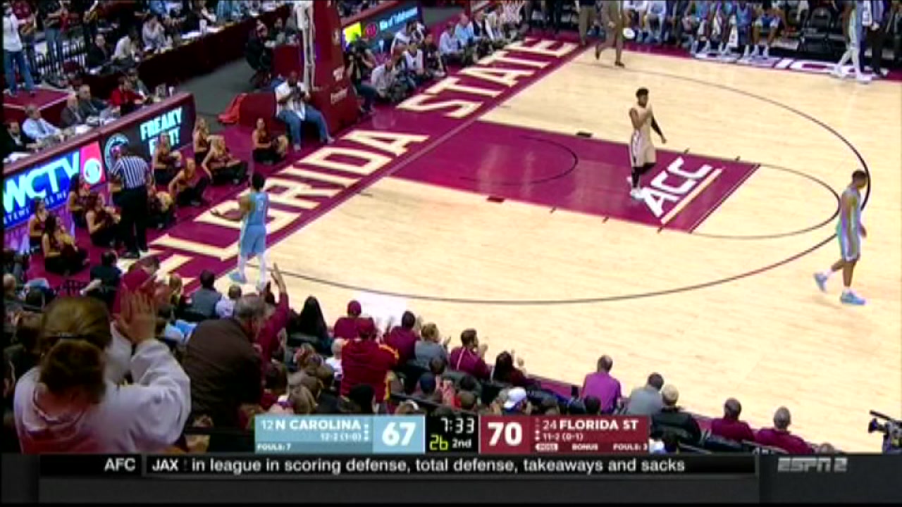 Official turns his back to UNC's Joel Berry