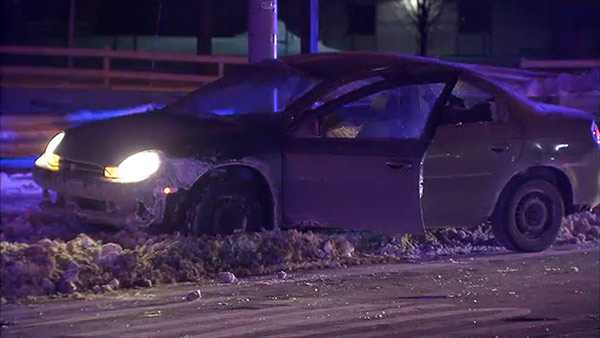 Man dead, woman critical after shooting at traffic light