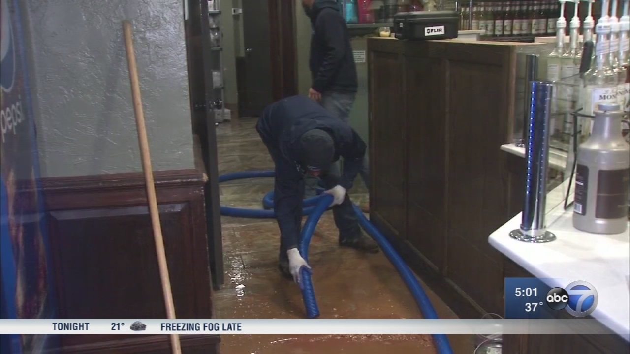 Burst pipe floods Near North Side coffee shop