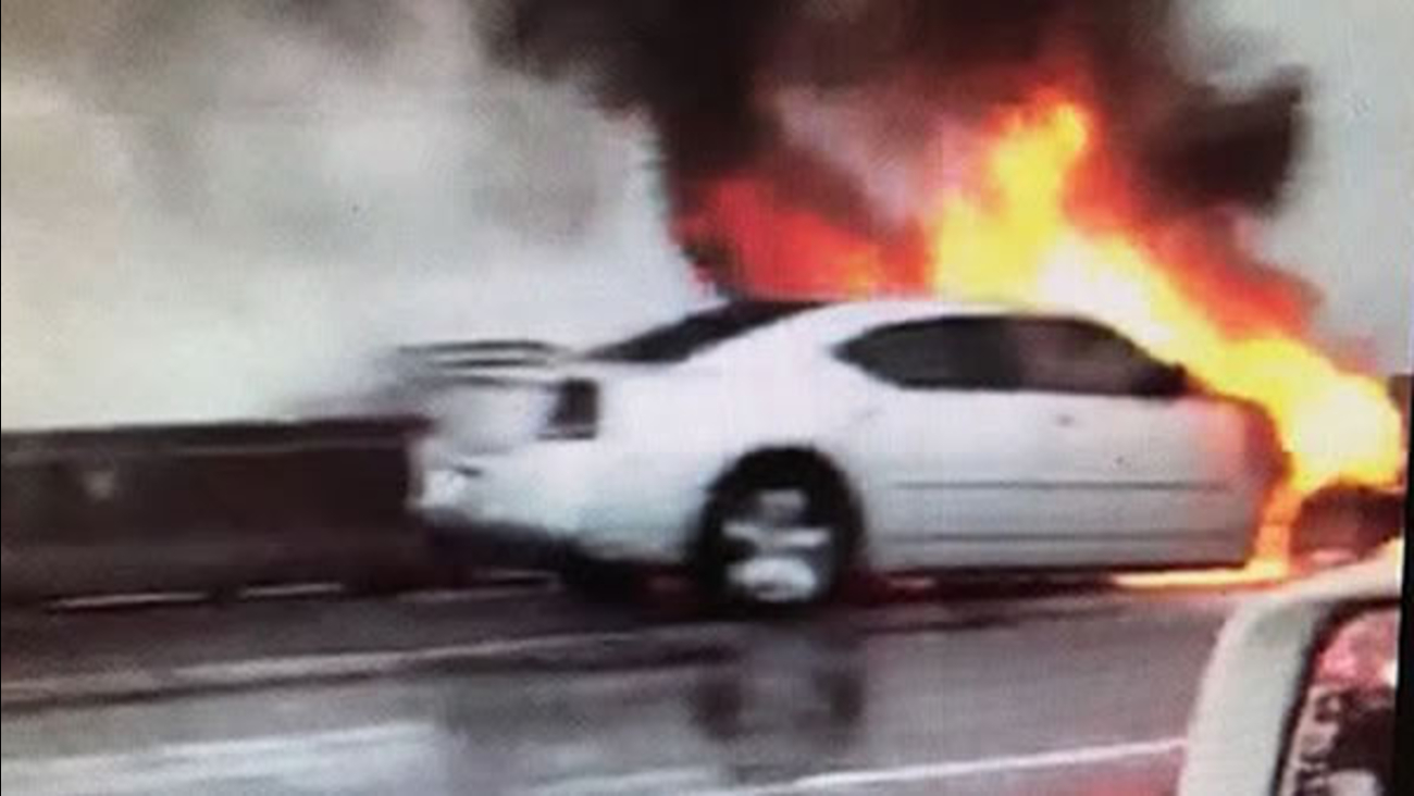 A car fire closed several lanes of Highway 92 on the San Mateo Bridge on Monday, Jan. 8, 2018.