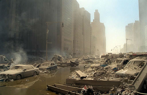 Rubble and ash fill lower Manhattan streets after two hijacked airliners were crashed into the towers of the World Trade Center in  New York, Tuesday, Sept. 11, 2001.