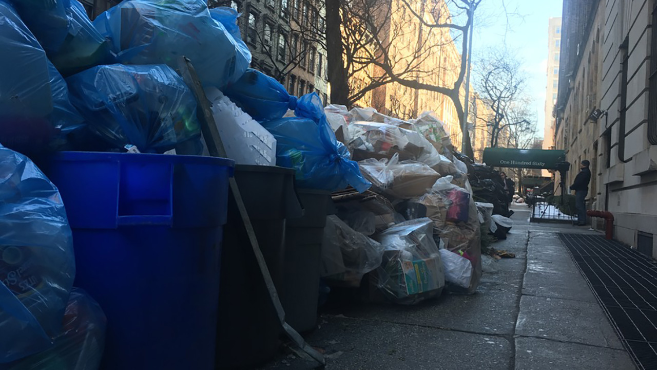 As NYC snow melts, garbage and slush piles growing