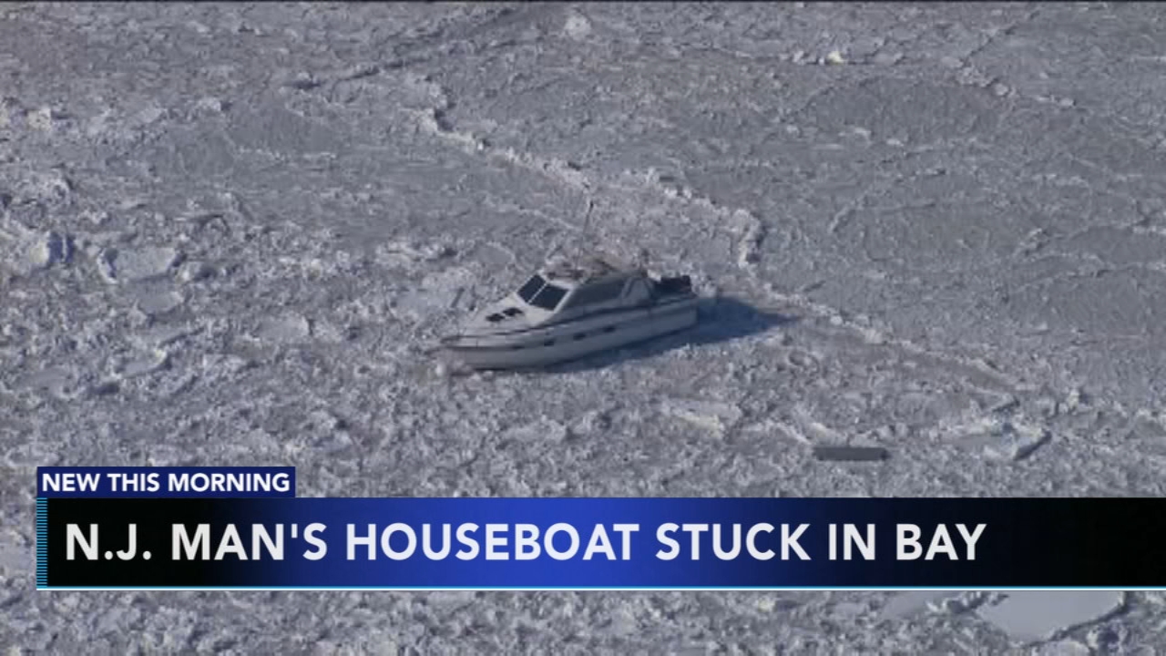 NJ man's houseboat stuck in bay
