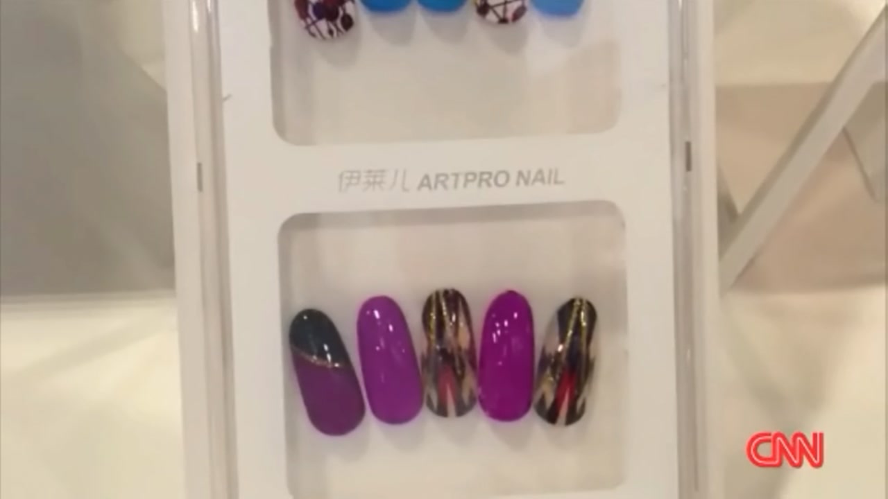 Create your own nail art with a mobile nail printer