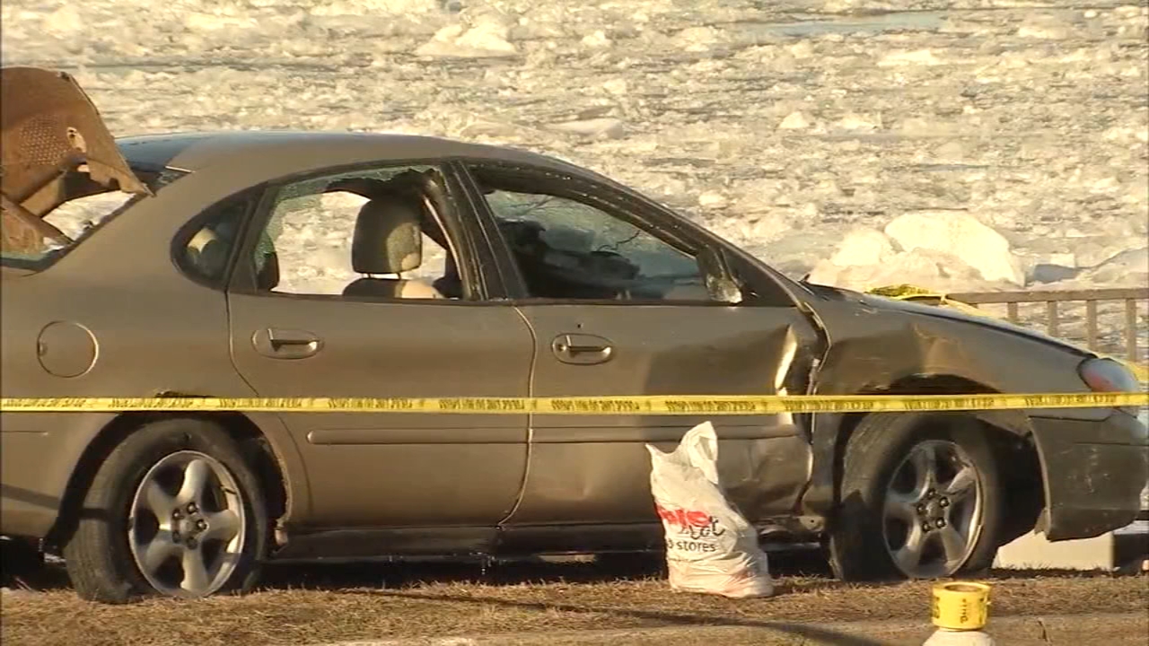 Woman dies after car pulled from river