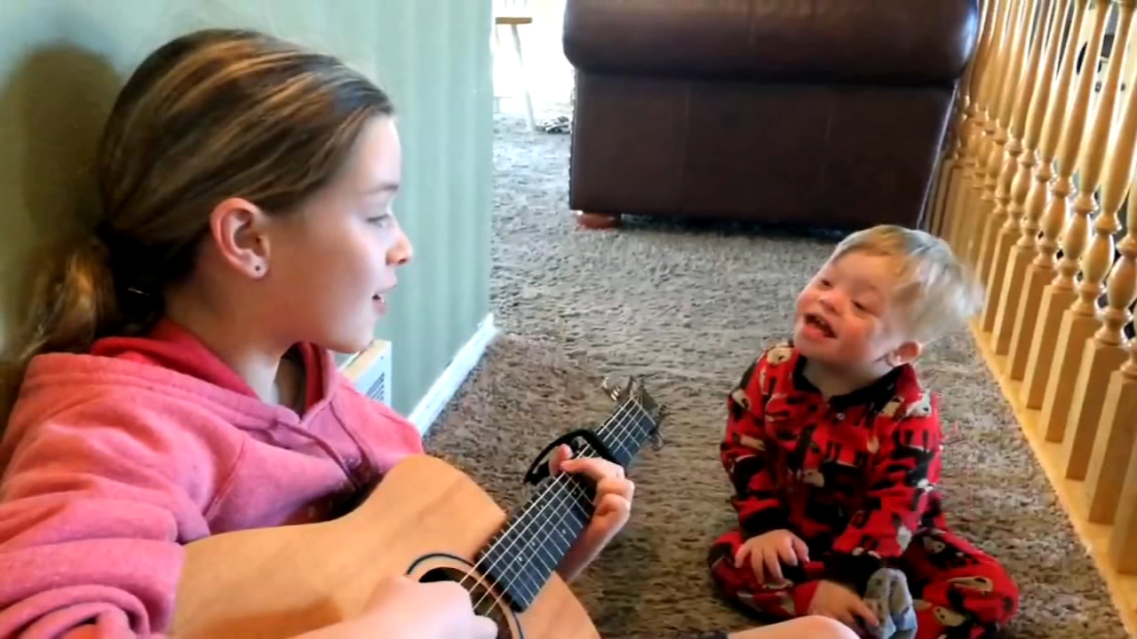 Big sister's music teaches toddler with Down syndrome to talk