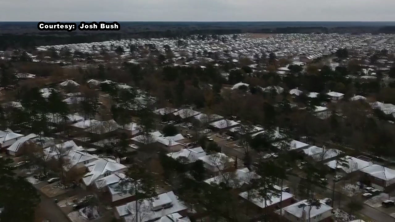 Drone video captures snowy rooftops in The Woodlands
