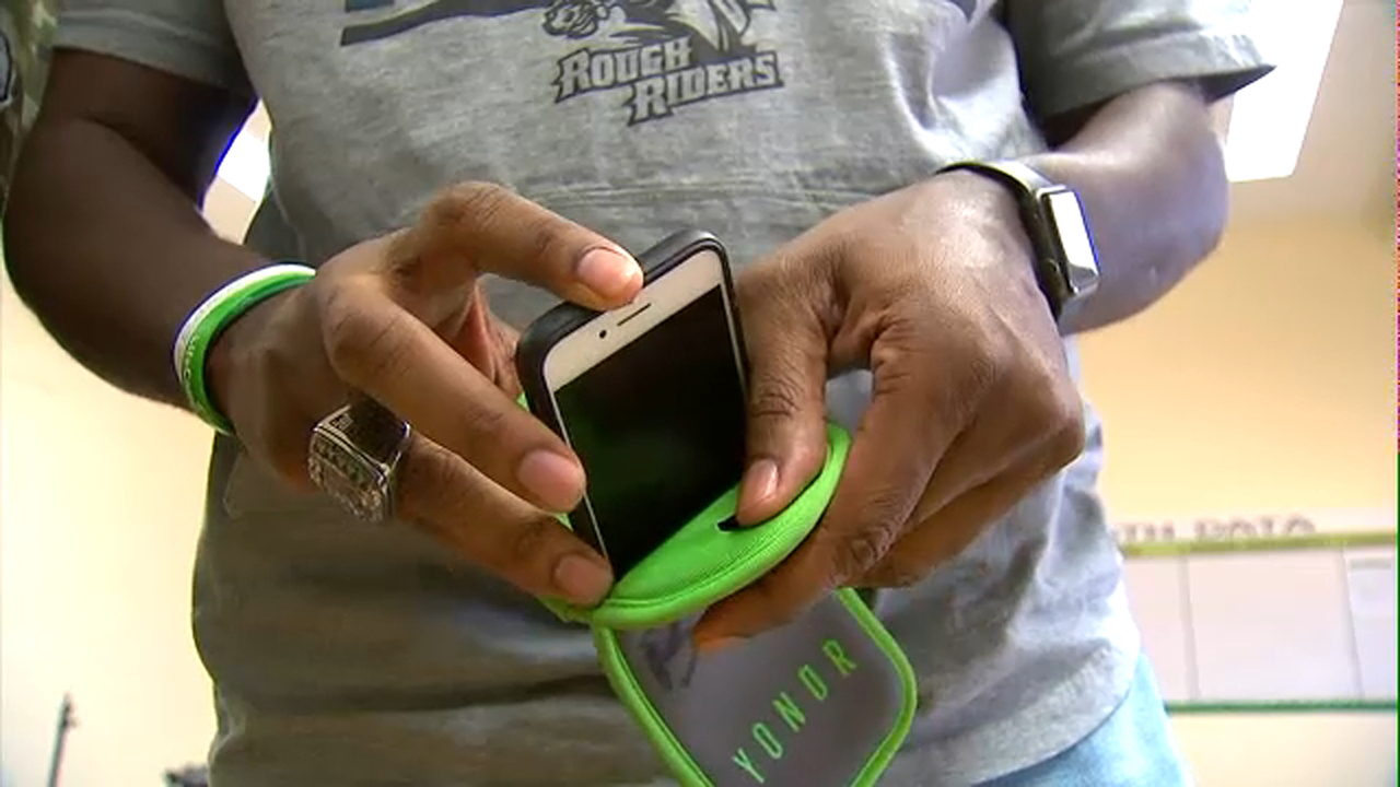 NJ school using phones as tactic against tardiness