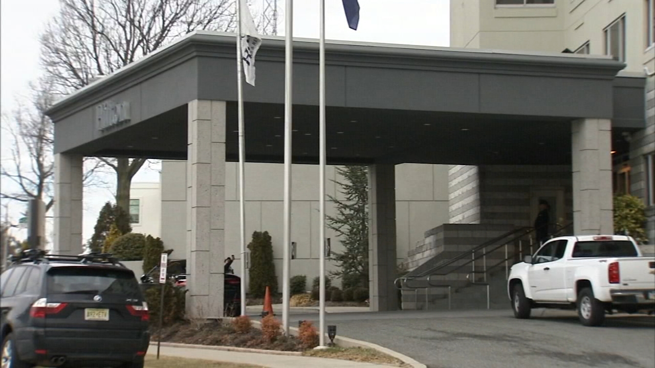 Gunman opens fire on driver parked at hotel