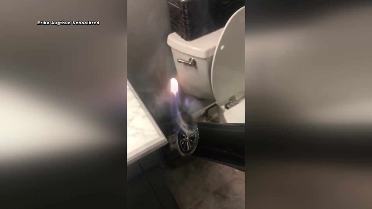 Woman's hair dryer shoots out fire and smoke 