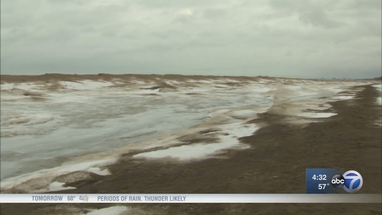 Dangerous shelf ice forms along Lake Michigan shoreline
