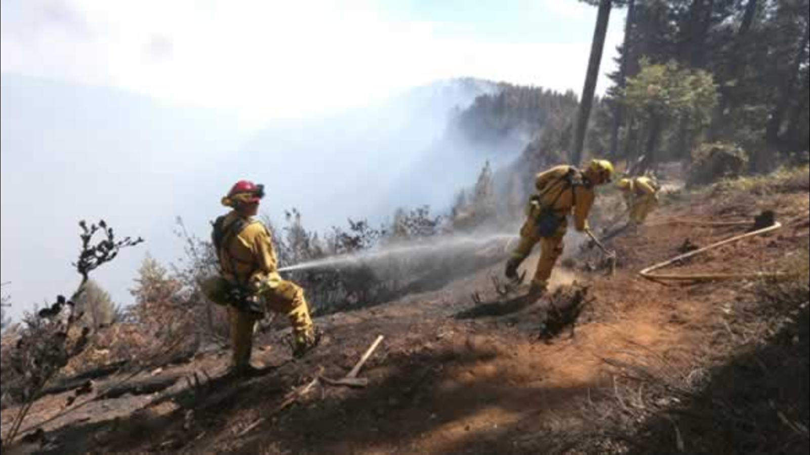 PHOTOS Massive fire threatening 12,000 homes around town of Pollock
