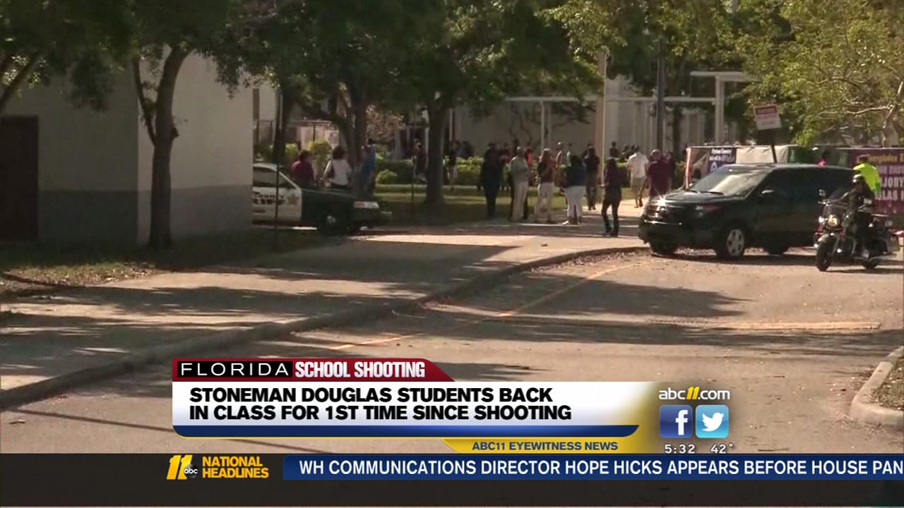 Students wary, hopeful, on return to site of school shooting