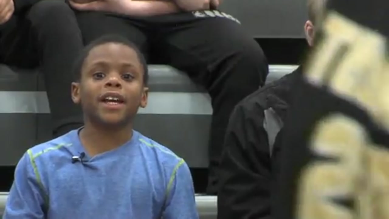 HS basketball team embraces special needs child