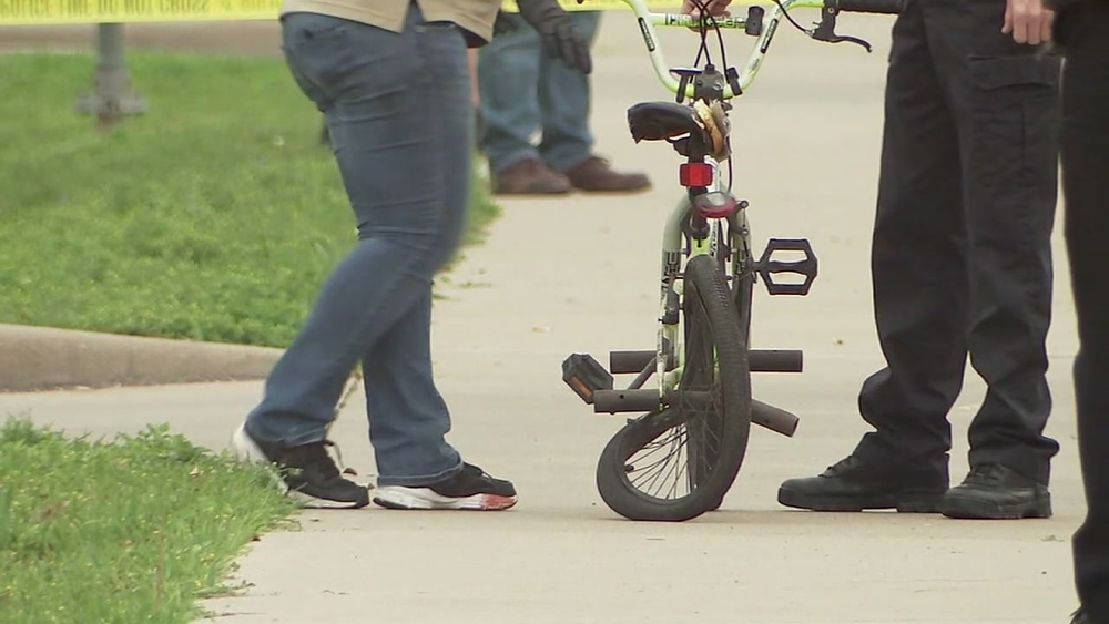 Child riding bike hit and killed by pickup truck