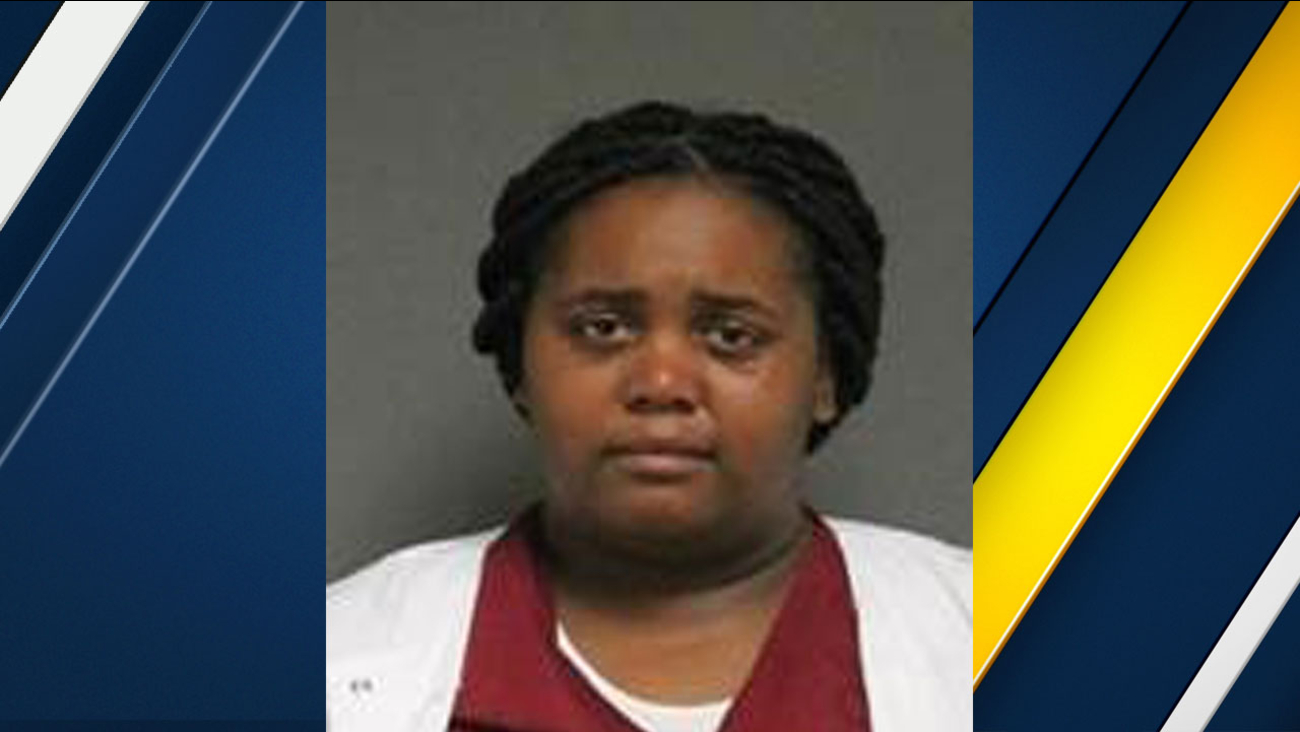Aujana Johnson-Payne is shown in a mugshot provided by Tustin police.