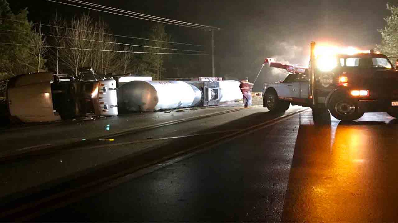 Liquid asphalt truck flips over, causes back up on Creedmoor Road in Wake County