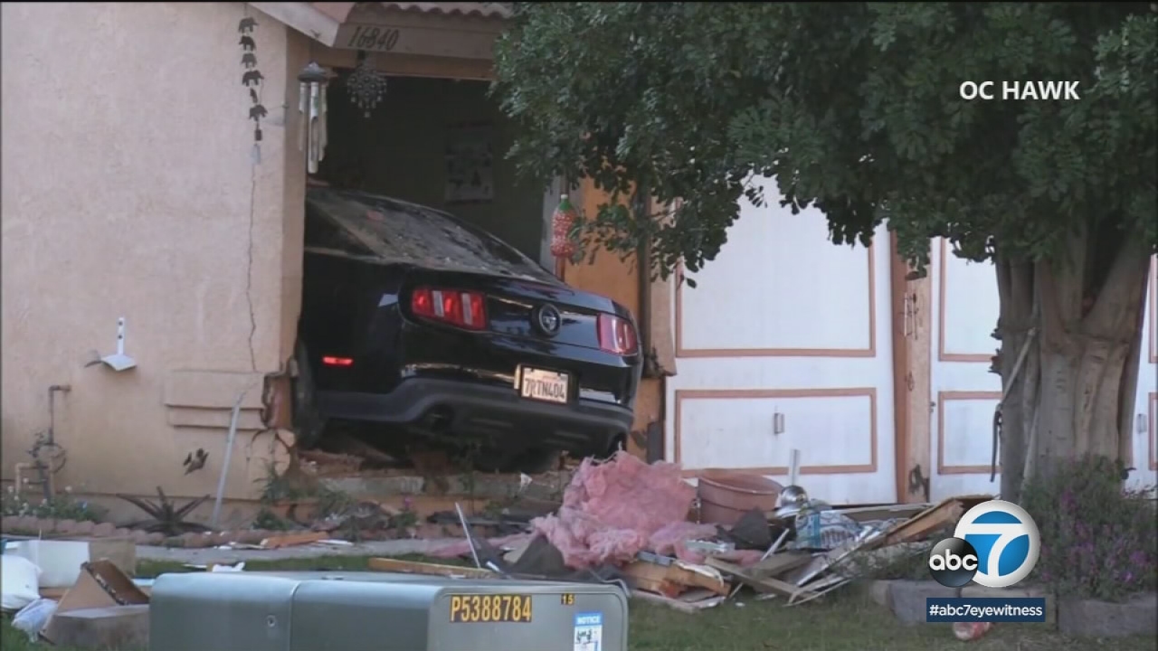 Woman trapped, killed in bedroom after car crashes into IE home