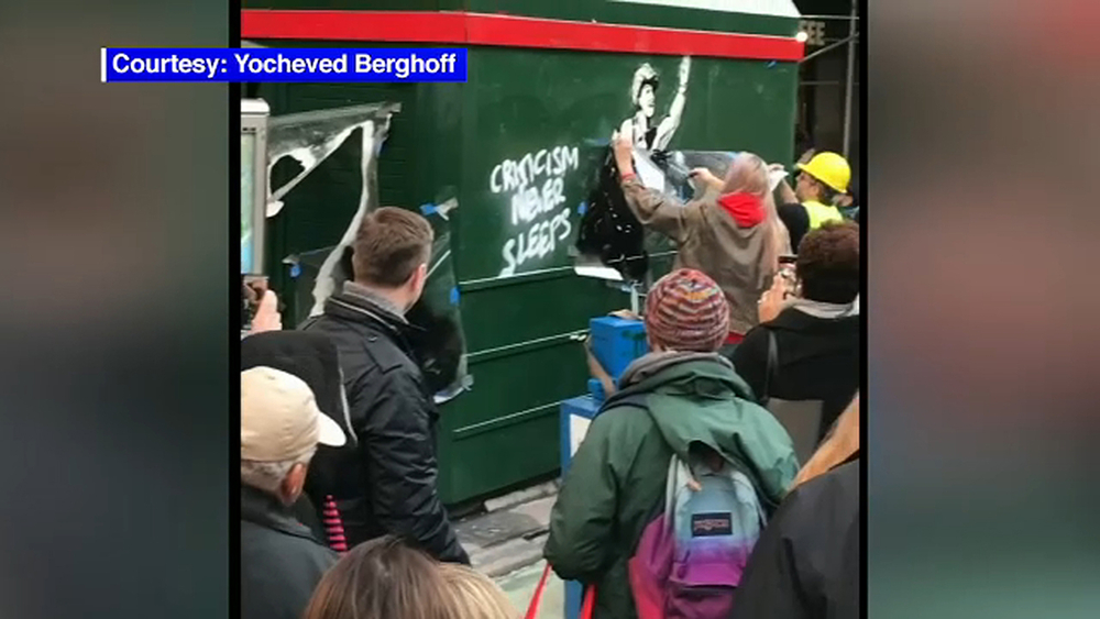 Large crowd gathers over possible Banksy sighting in Chelsea