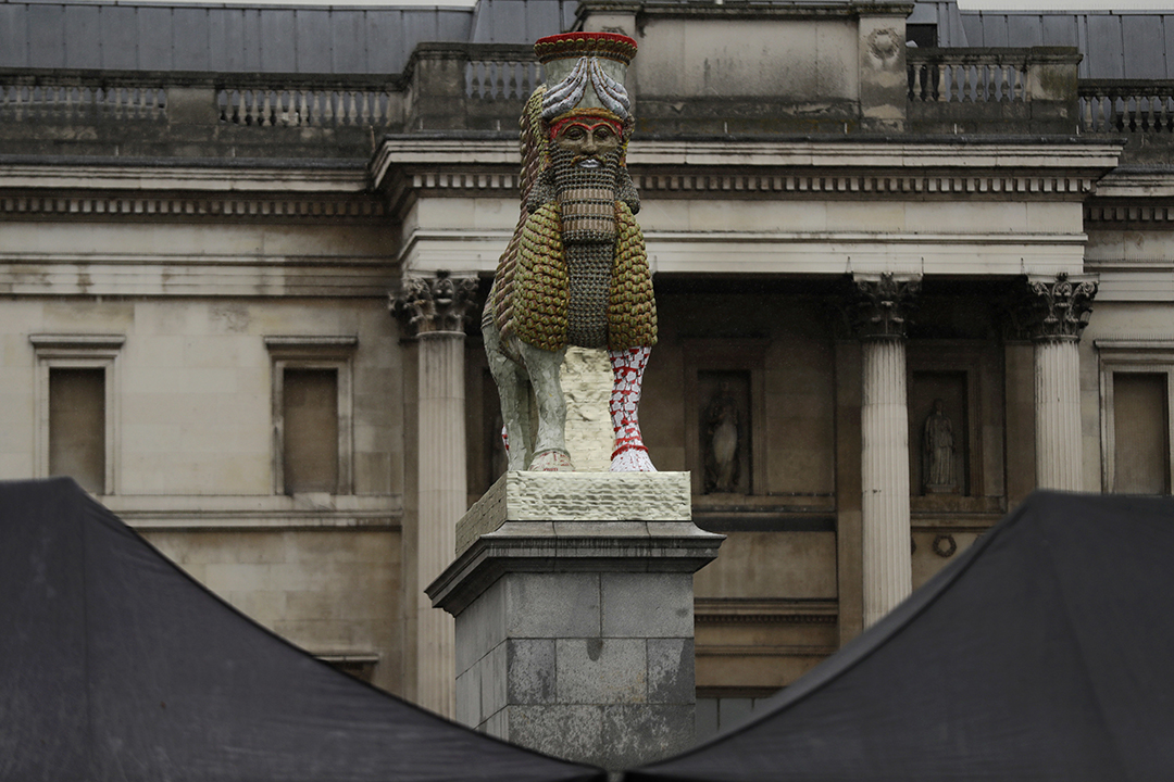 "The Invisible Enemy Should Not Exist" sculpture was unveiled on Wednesday in Trafalgar Square in London.