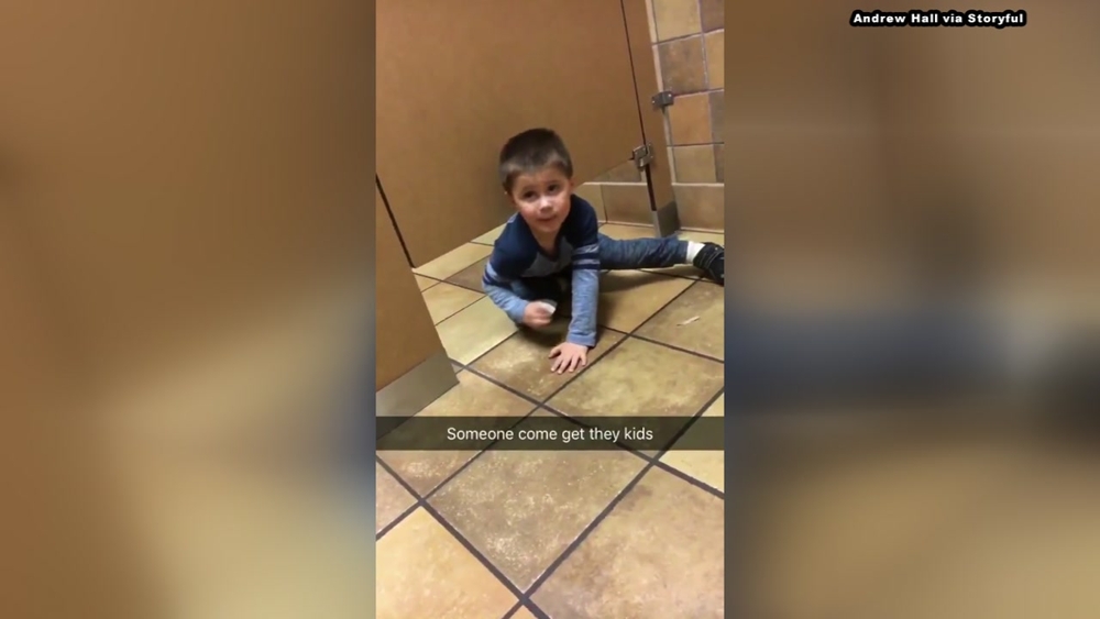 Kid crawls under bathroom stall while Chick-fil-A attempts to use bathroom