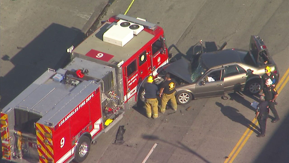 2 injured when car hits fire truck in downtown LA