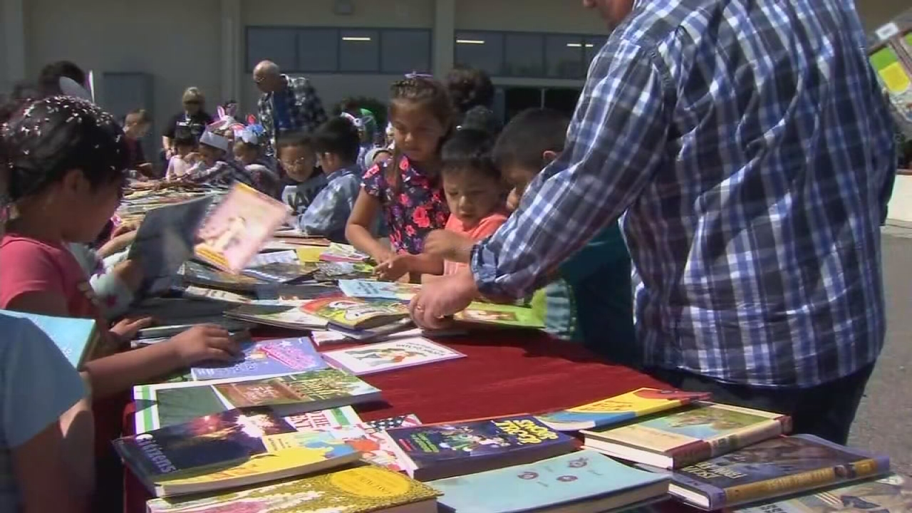 Planada students surprised with new books after storm flooded library