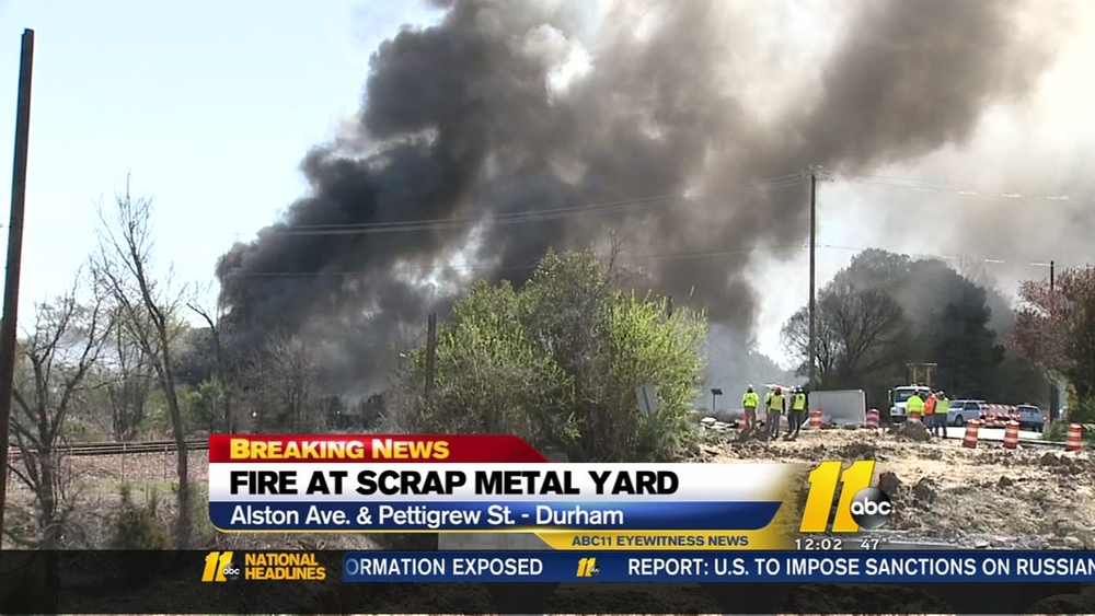 Heavy smoke billows from fire at scrap metal recycling center in downtown Durham