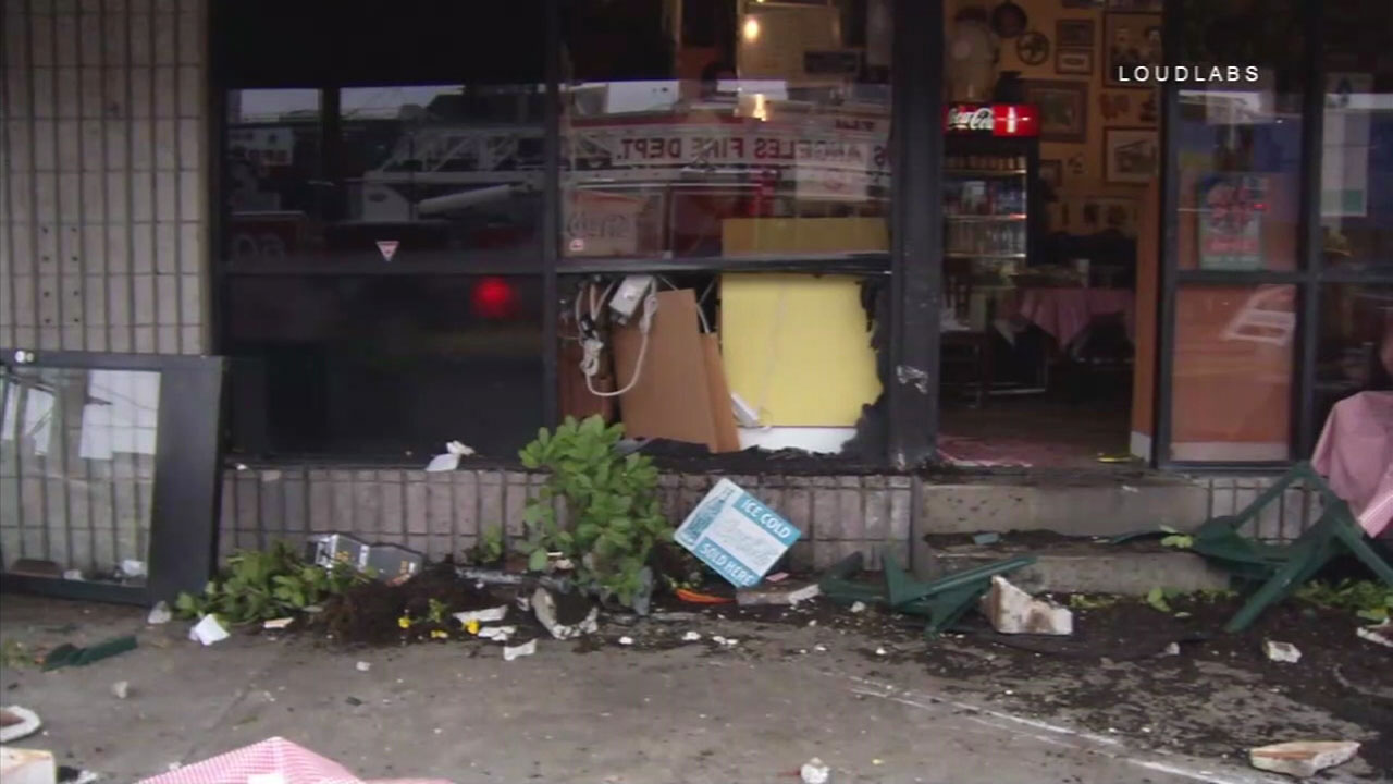 Man injured after being hit by SUV that crashed into Melrose business