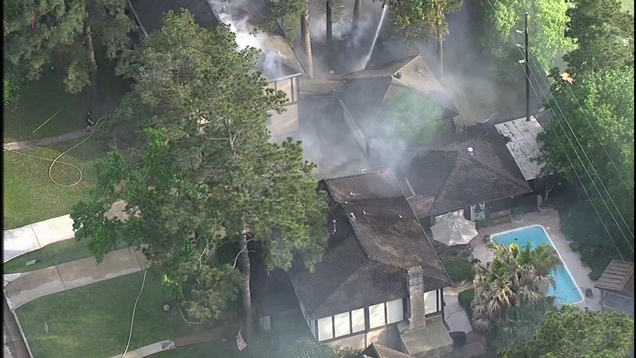 Wind and burning pine needles spread fire to 3 homes in NW Harris Co.