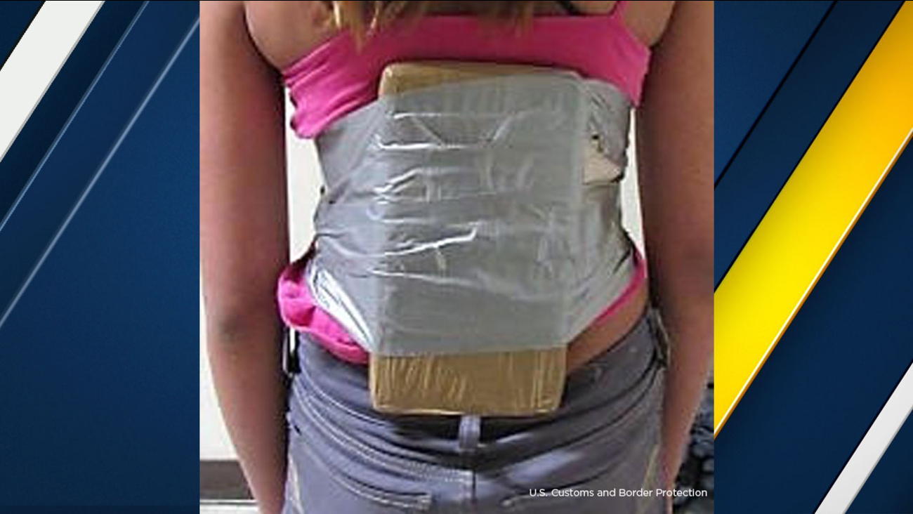A 12-year-old girl seen with 2 pounds of cocaine wrapped around her torso.